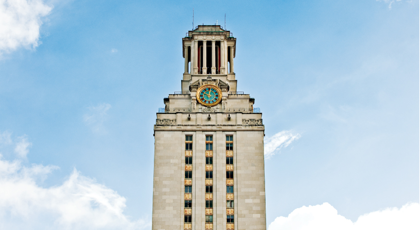 UT Tower and blue sky with clouds